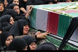 خاکسپاری پیکر شهدای گمنام در میدان امام حسین(ع)